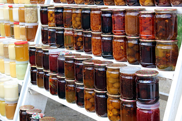 Row of meal prep containers with colourful ingredients