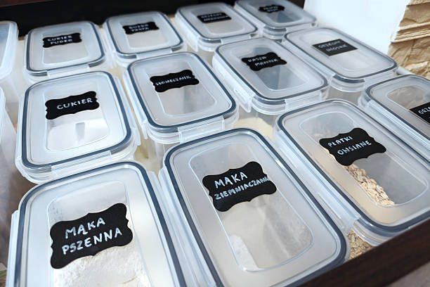 Organised pantry with labelled jars and staples